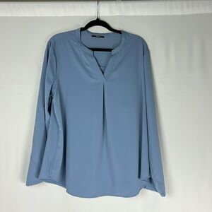 Gaharu woman’s blue long sleeve top. Size XL